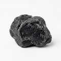 Illustrative Shamanite black calcite specimen on a white background