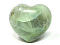 Garnierite polished heart crystal on white background